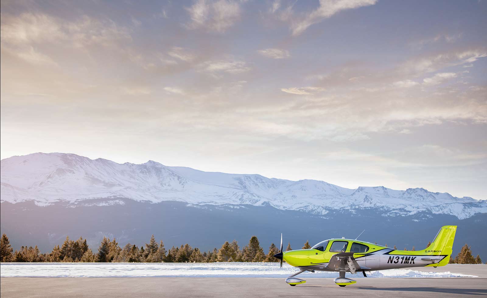 Cirrus SR-22T parked at a mountainous airport